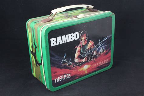 how much is a metal rambo lunch box worth|Vintage 1983 Rambo Metal Lunch Box WITH THERMOS Great .